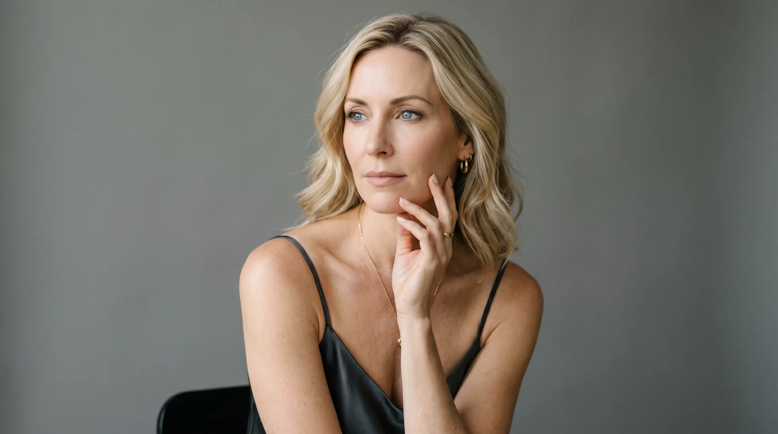 A woman considering facial rejuvenation